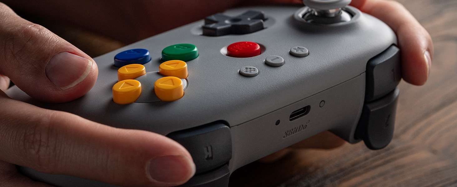 8BitDo 64 Bluetooth Controller (Hardware) - Review 6 8BitDo 64 Bluetooth Controller Lifestyle V2 3 https://www.mkaugaming.com/all-review-list/8bitdo-64-bluetooth-controller-hardware-review/